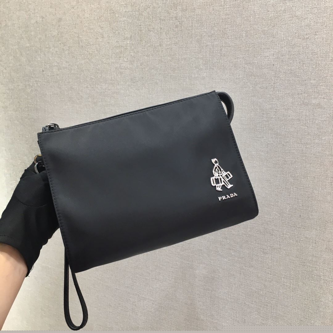 Pra*a clutch bags